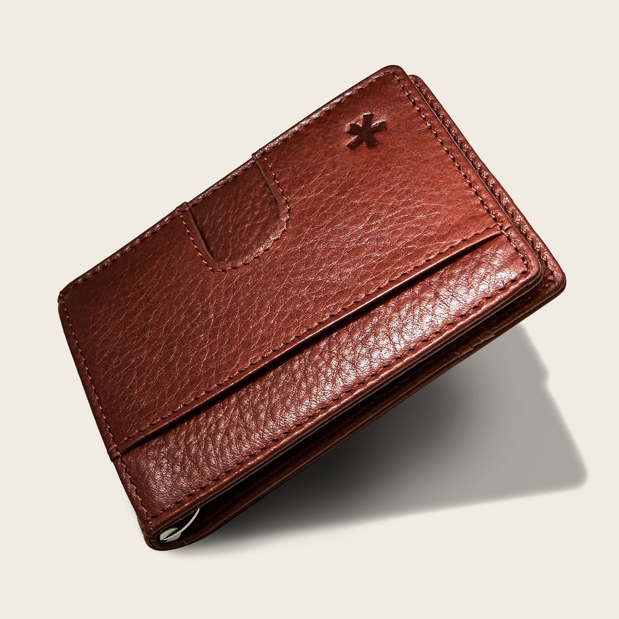 Origin Wallet — A bifold wallet made with ethically sourced Argentinian leather. Displayed in Acorn.