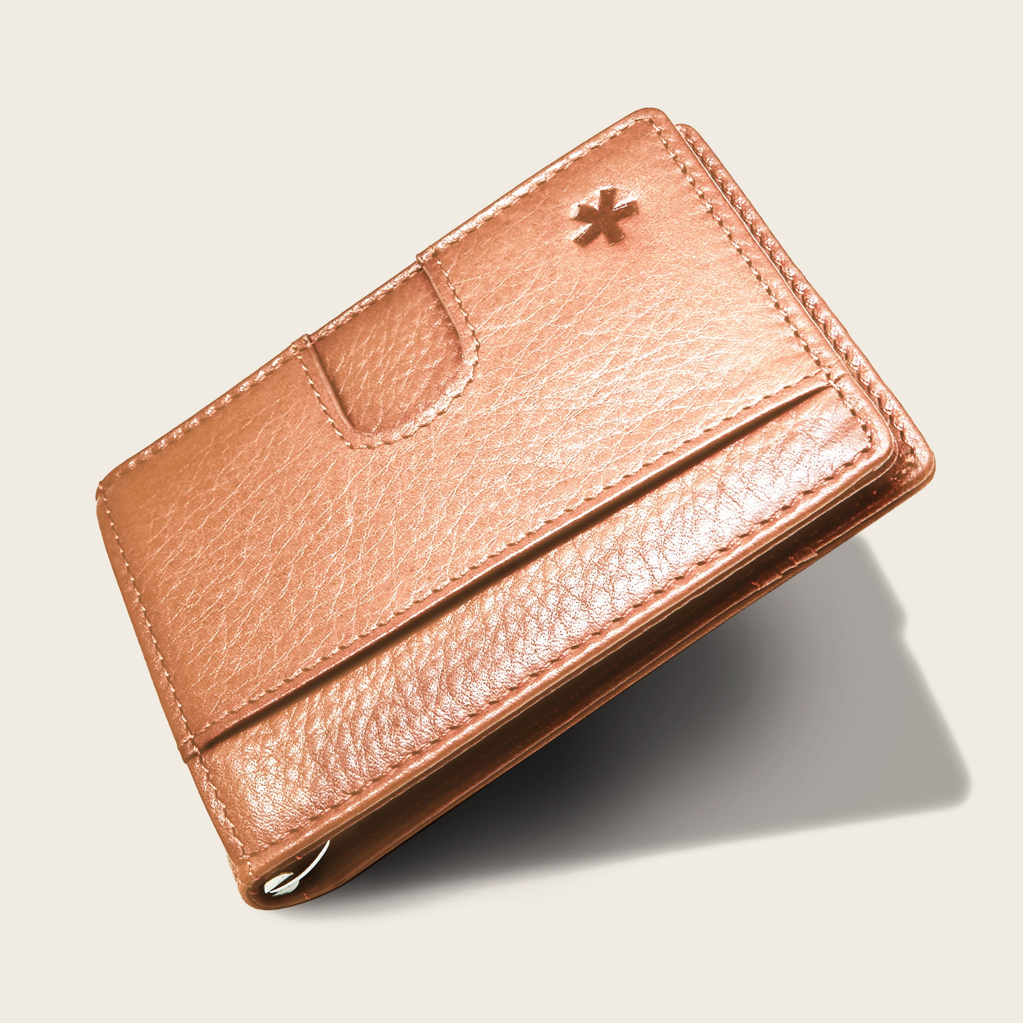 Origin Wallet — A bifold wallet made with ethically sourced Argentinian leather. Displayed in Sand.
