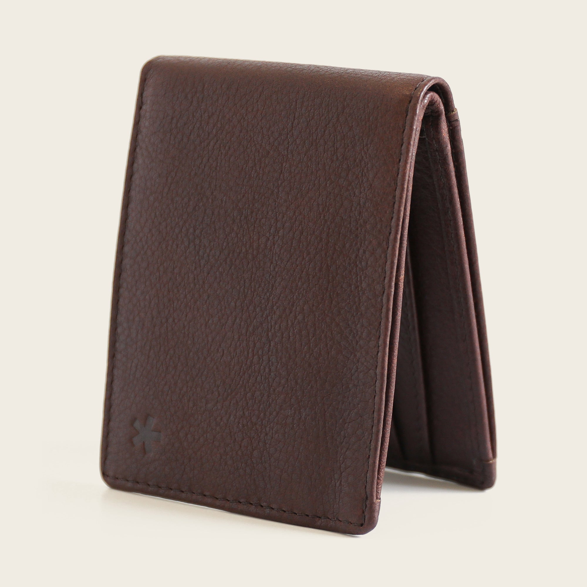 The Swear Brands Venture Wallet pictured in Walnut (brown) premium leather.