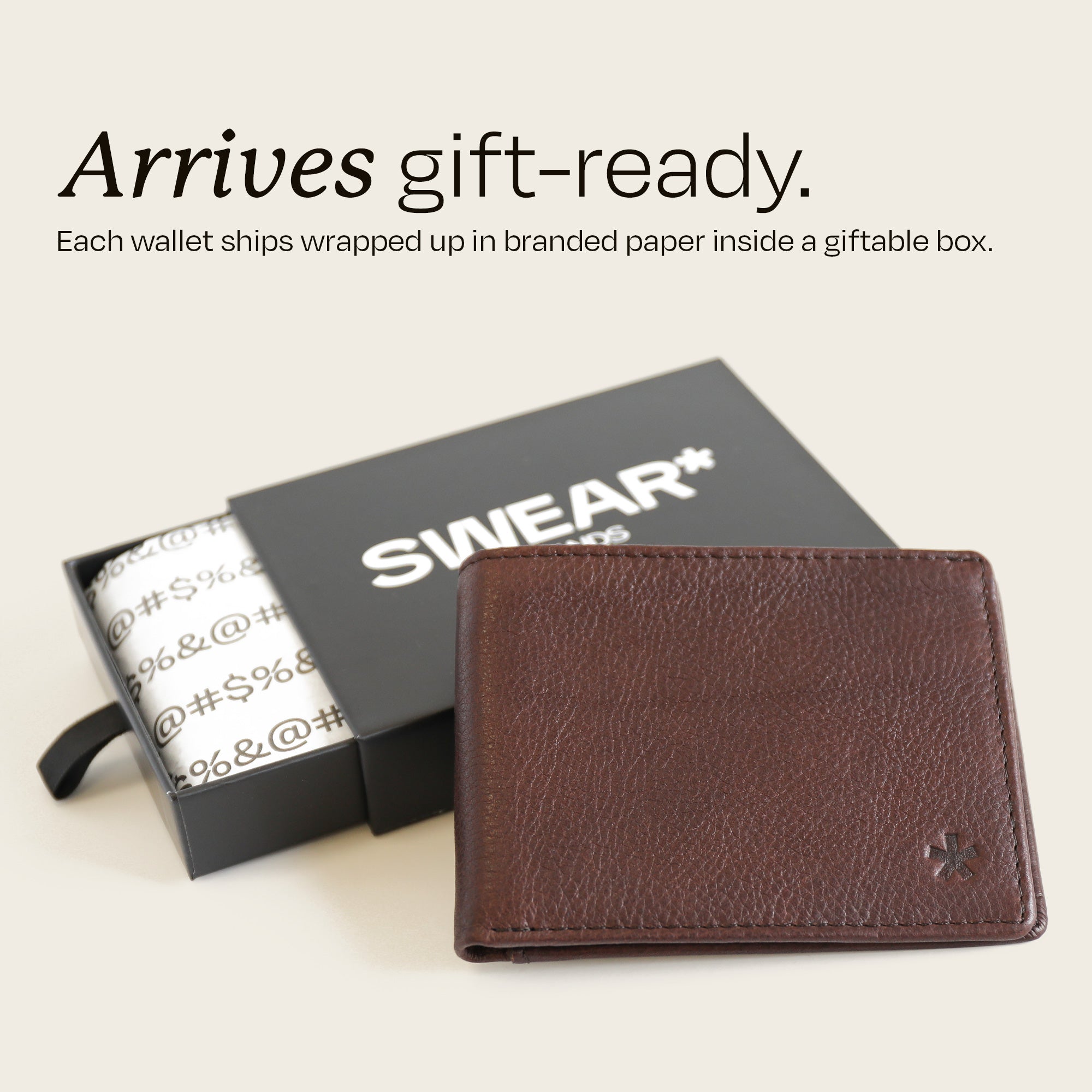 The Swear Brands Venture Wallet pictured in Walnut (brown). Text reads: "Arrives gift-ready. Each wallet ships wrapped up in branded paper inside a giftable box."