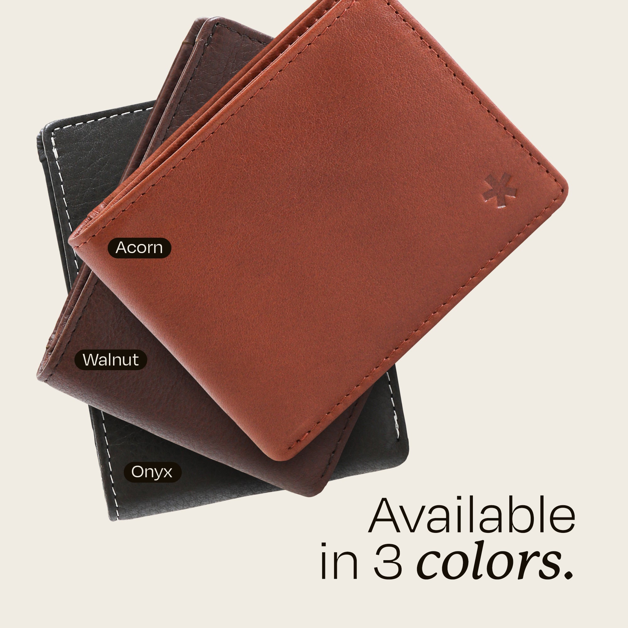 Three of the Swear Brands Venture wallets in colors Onyx, Walnut and Acorn stacked atop one another. Text reads: "Available in 3 colors."